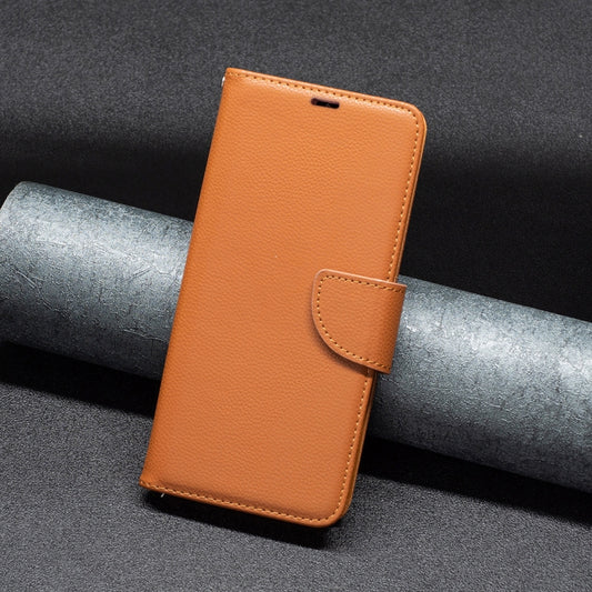 For iPhone 16 Plus Litchi Texture Pure Color Flip Leather Phone Case(Brown) by buy2fix