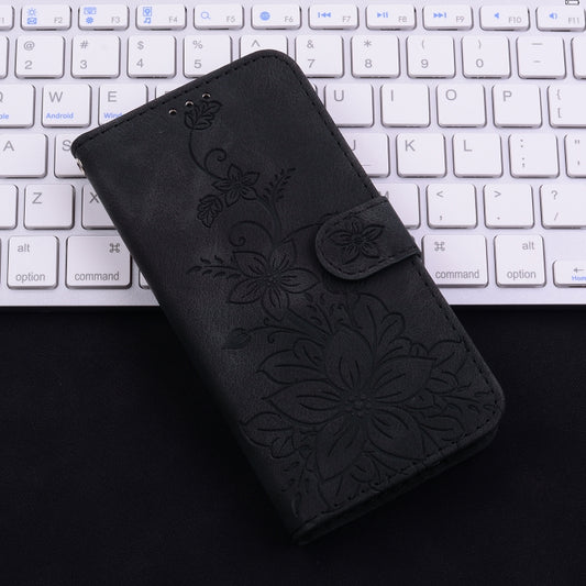 For iPhone 16 Lily Embossed Leather Phone Case(Black) by buy2fix