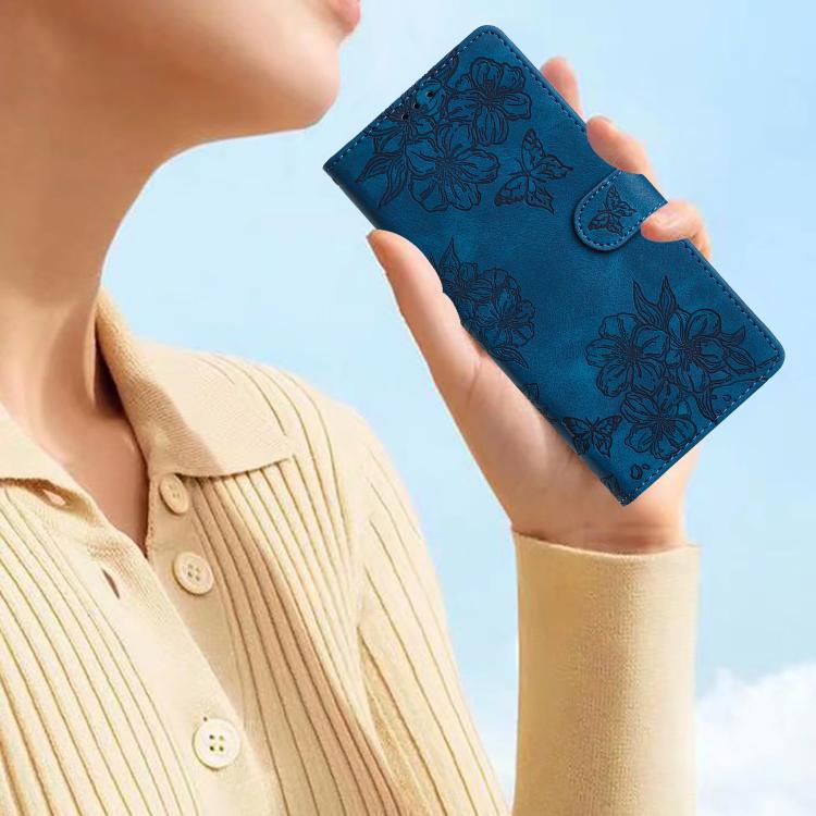 For iPhone 16e Cherry Blossom Butterfly Skin Feel Embossed PU Phone Case(Blue) - iPhone 16e Cases by buy2fix | Online Shopping UK | buy2fix