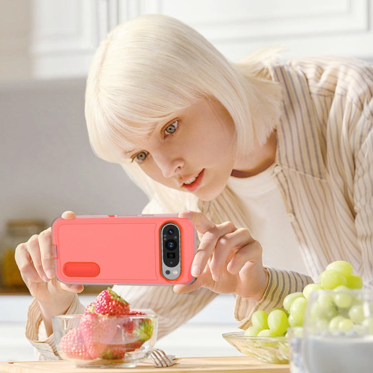 For Google Pixel 9 Rugged PC + Silicone Phone Case with Holder(Transparent+Orange) by buy2fix