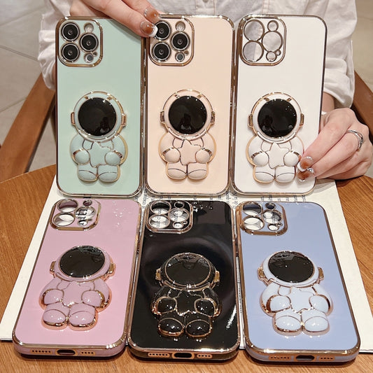 For iPhone 16 Plus Embrace Stars Electroplating Astronaut Holder Phone Case(Pink) by buy2fix