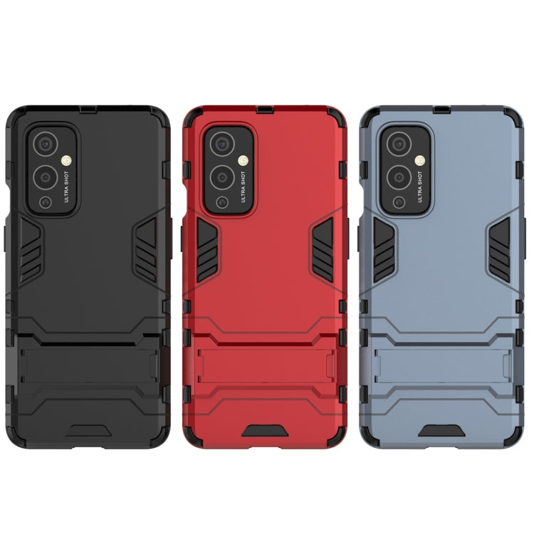 For OnePlus 9 PC + TPU Shockproof Protective Case with Holder(Black) by buy2fix