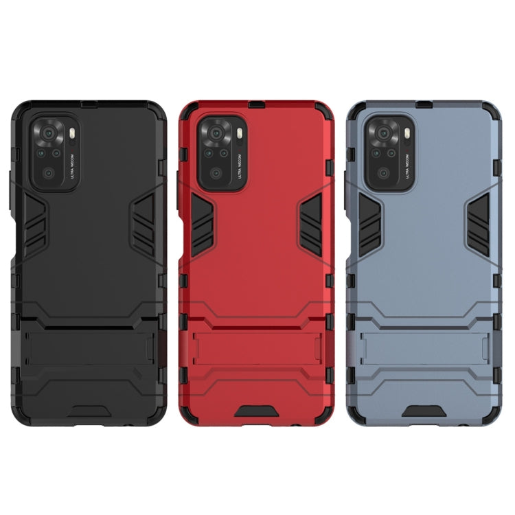For Xiaomi Redmi Note 10 4G Shockproof PC + TPU Protective Case with Hidden Holder(Red) by buy2fix