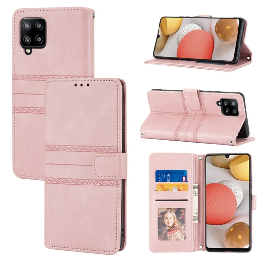 For Samsung Galaxy A12 5G Embossed Striped Magnetic Buckle PU + TPU Horizontal Flip Leather Case with Holder & Card Slot & Wallet & Photo Frame & Sling(Pink)
