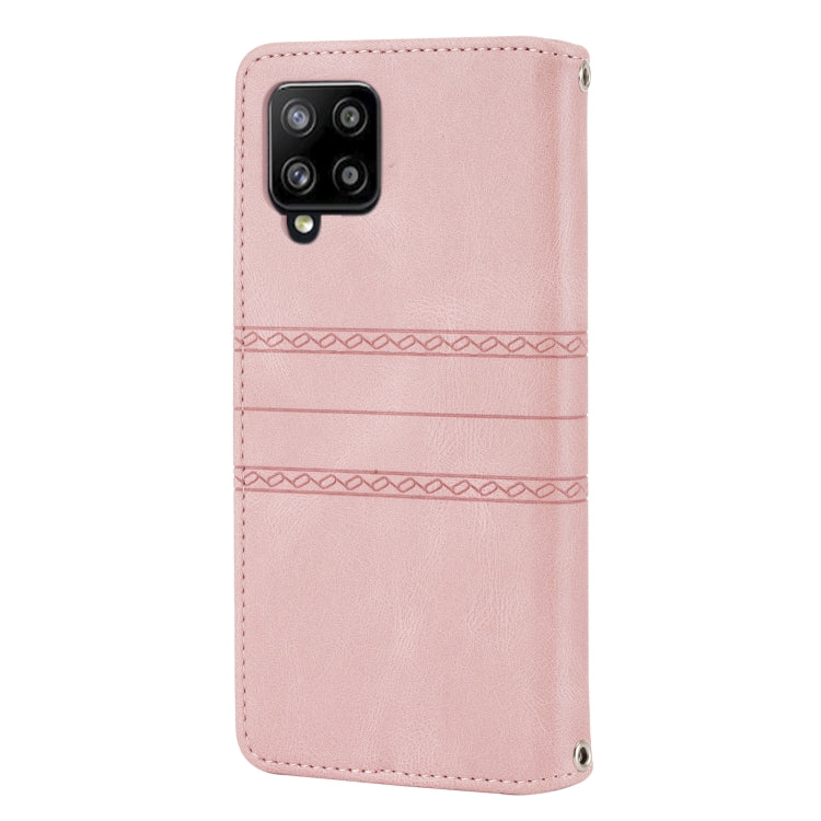 For Samsung Galaxy A12 5G Embossed Striped Magnetic Buckle PU + TPU Horizontal Flip Leather Case with Holder & Card Slot & Wallet & Photo Frame & Sling(Pink) by buy2fix