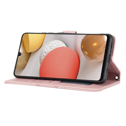 For Samsung Galaxy A12 5G Embossed Striped Magnetic Buckle PU + TPU Horizontal Flip Leather Case with Holder & Card Slot & Wallet & Photo Frame & Sling(Pink) by buy2fix