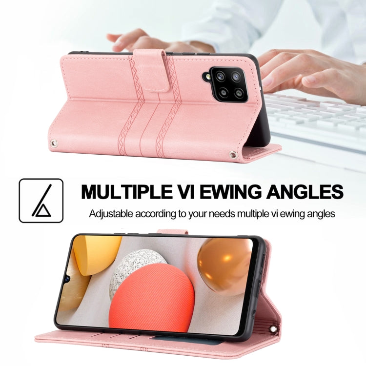 For Samsung Galaxy A12 5G Embossed Striped Magnetic Buckle PU + TPU Horizontal Flip Leather Case with Holder & Card Slot & Wallet & Photo Frame & Sling(Pink) by buy2fix