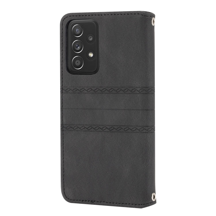 For Samsung Galaxy A52 5G / 4G Embossed Striped Magnetic Buckle PU + TPU Horizontal Flip Leather Case with Holder & Card Slot & Wallet & Photo Frame & Sling(Black) by buy2fix