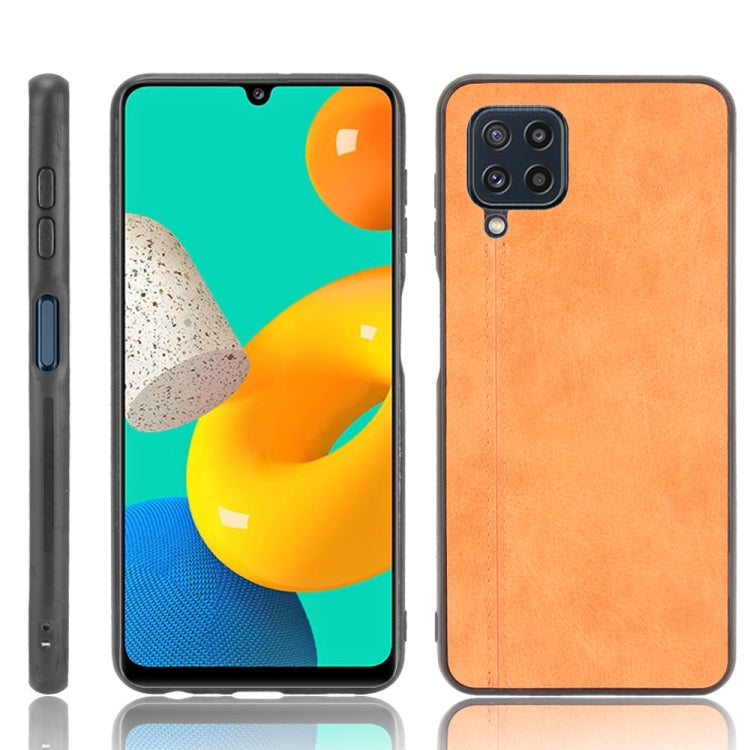 For Samsung Galaxy M32 4G Shockproof Sewing Cow Pattern Skin PC + PU + TPU Case(Orange) by buy2fix