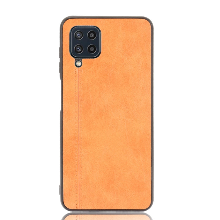 For Samsung Galaxy M32 4G Shockproof Sewing Cow Pattern Skin PC + PU + TPU Case(Orange) by buy2fix