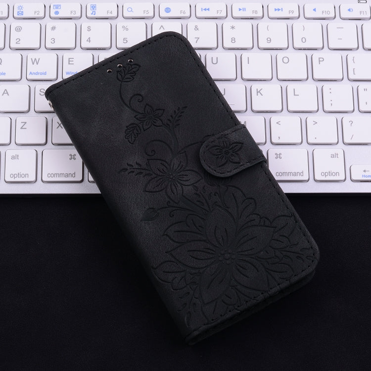 For iPhone 16 Lily Embossed Leather Phone Case(Black) by buy2fix