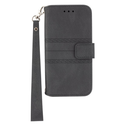 For iPhone 16e Embossed Stripes Skin Feel Leather Phone Case(Black) by buy2fix