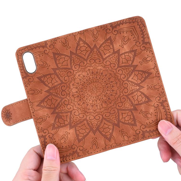 For iPhone 16e Mandala Embossed Dual-Fold Calf Leather Phone Case(Brown) - iPhone 16e Cases by buy2fix | Online Shopping UK | buy2fix