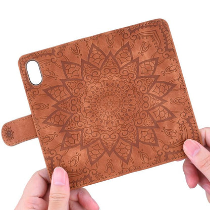 For iPhone 16e Mandala Embossed Dual-Fold Calf Leather Phone Case(Brown) - iPhone 16e Cases by buy2fix | Online Shopping UK | buy2fix