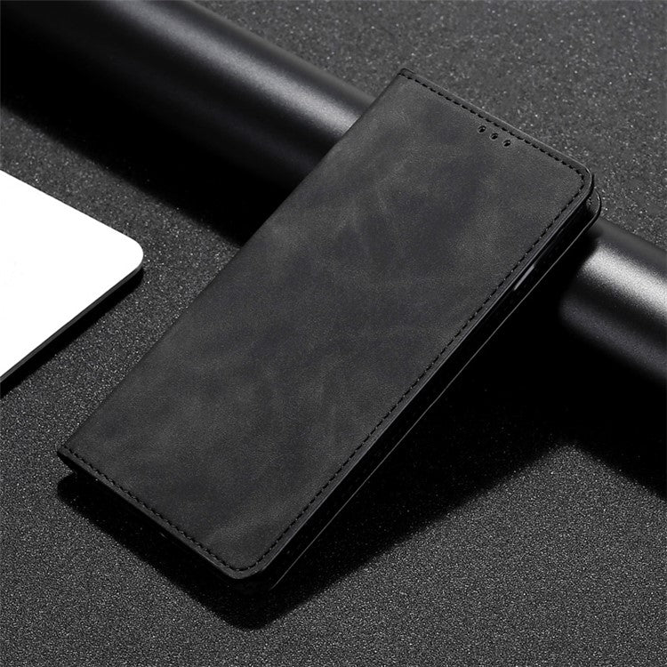 For Motorola Edge 5G 2024 Skin Feel Magnetic Leather Phone Case(Black) - Motorola Cases by buy2fix | Online Shopping UK | buy2fix