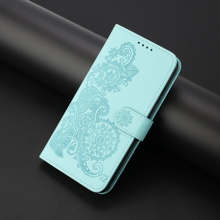 For Xiaomi Redmi K70 Datura Flower Embossed Flip Leather Phone Case(Light blue) - K70 Cases by buy2fix | Online Shopping UK | buy2fix