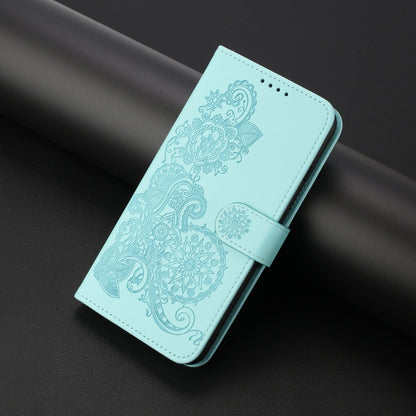 For iPhone 16e Datura Flower Embossed Flip Leather Phone Case(Light Blue) by buy2fix