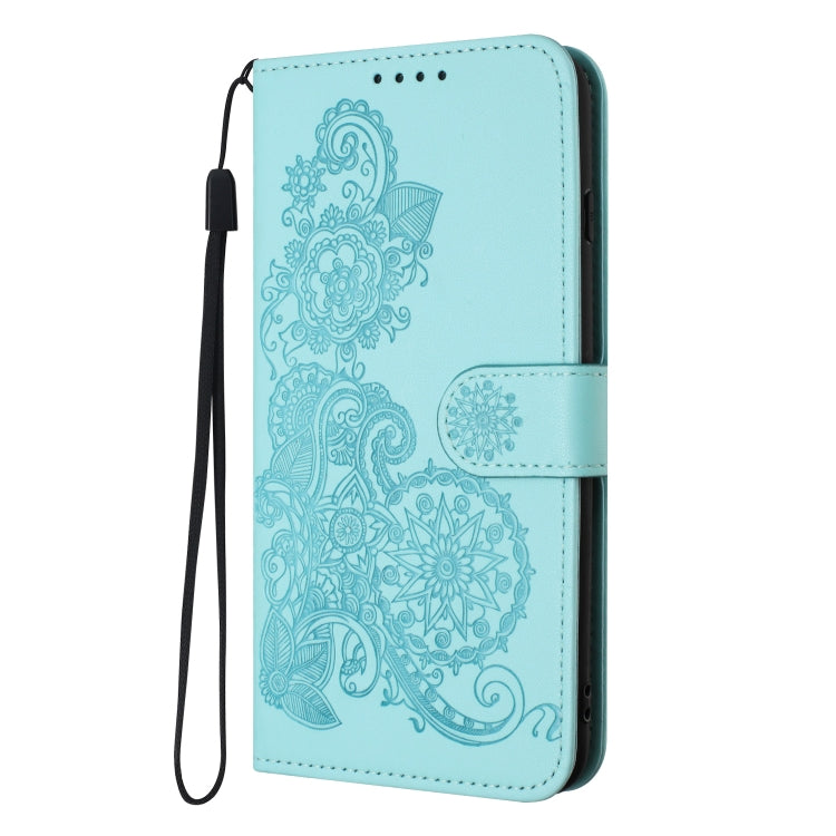 For iPhone 16e Datura Flower Embossed Flip Leather Phone Case(Light Blue) by buy2fix