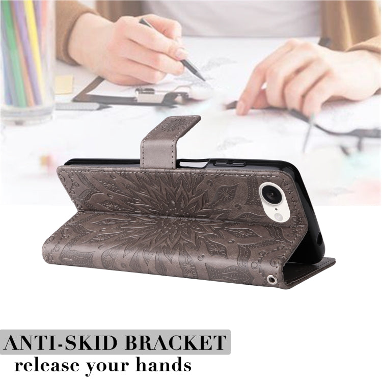 For iPhone 16e Embossed Sunflower Pattern Flip Leather Phone Case(Grey) by buy2fix