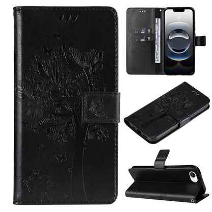 For iPhone 16e Tree & Cat Embossed Pattern Flip Leather Phone Case(Black) by buy2fix