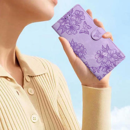 For iPhone 16e Cherry Blossom Butterfly Skin Feel Embossed PU Phone Case(Purple) - iPhone 16e Cases by buy2fix | Online Shopping UK | buy2fix