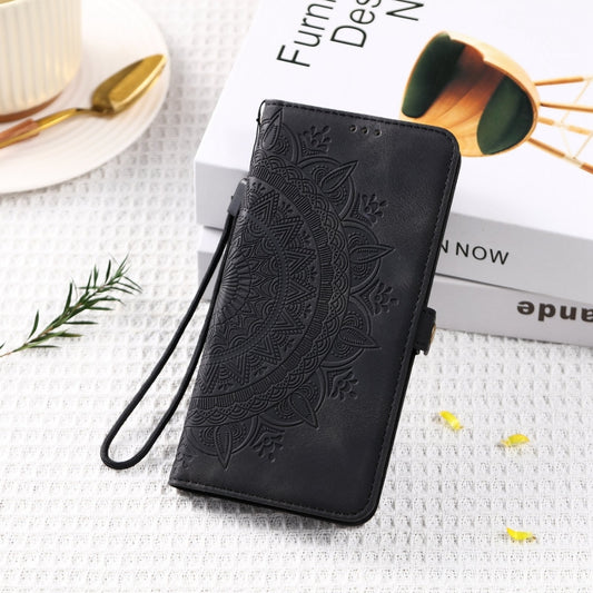 For iPhone 16 Plus Skin Feel Totem Embossed Leather Phone Case(Black) by buy2fix