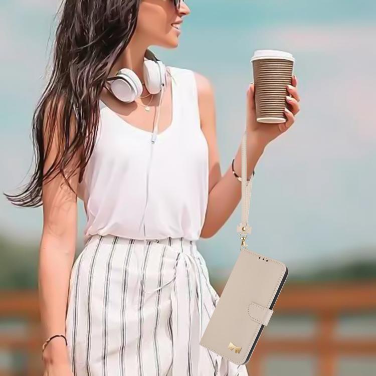 For Google Pixel 10 Pro / 9 Pro Metal Bow Leather Phone Case with Hand Strap(Apricot) - Google Cases by buy2fix | Online Shopping UK | buy2fix