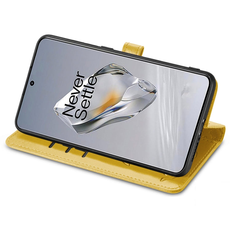 For OnePlus 12 Cat and Dog Embossed Leather Phone Case(Yellow) by buy2fix