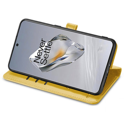 For OnePlus 12 Cat and Dog Embossed Leather Phone Case(Yellow) by buy2fix