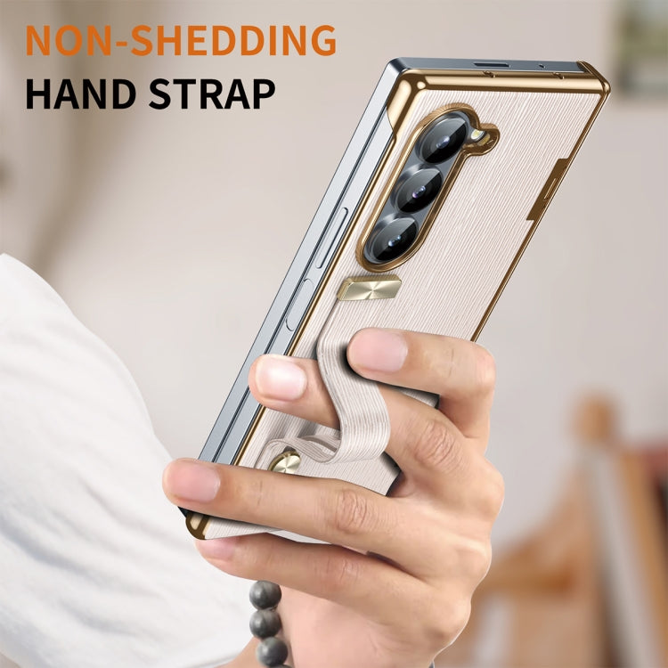 For Samsung Galaxy Z Fold5 Retractable Wrist Strap Invisible Stand Phone Case(Pink) - Galaxy Z Fold5 Cases by buy2fix | Online Shopping UK | buy2fix
