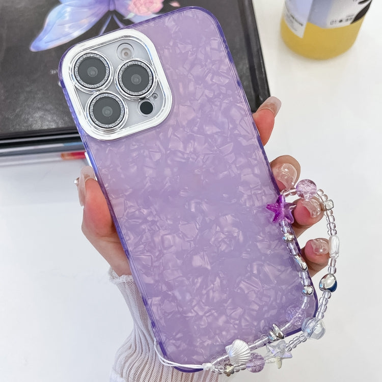 For iPhone 16 Plus Plating Glitter Texture Chain Wristband TPU Phone Case with Lens Film(Purple Shell Pattern) - iPhone 16 Plus Cases by buy2fix | Online Shopping UK | buy2fix