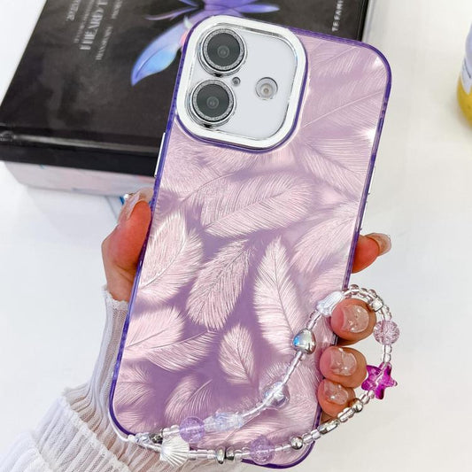 For iPhone 16 Plating Glitter Texture Chain Wristband TPU Phone Case with Lens Film(Purple Feathers) by buy2fix