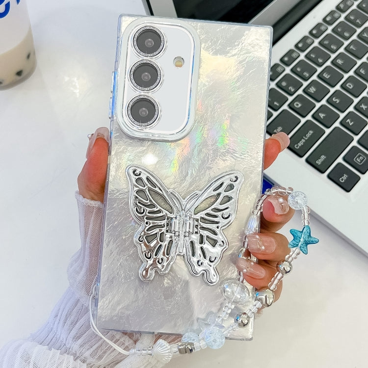 For Samsung Galaxy S25+ 5G Plating Glitter Lens Film Texture Butterfly Holder Wristband Phone Case(White Tinfoil Texture) by buy2fix