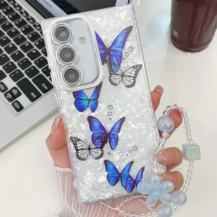 For Samsung Galaxy S25+ 5G Plating Texture Butterfly Wristband TPU Phone Case with Glitter Lens Film(Blue Butterflies HU3) by buy2fix