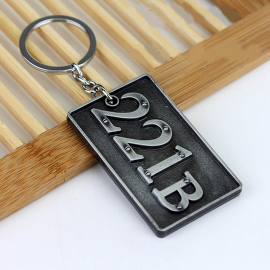 Détective Sherlock 221B Porte-clés Porte-clés de voiture Outil multifonctionnel Porte-clés Porte-clés Anneaux Porte-Pendentif Pièces automobiles (Argent)