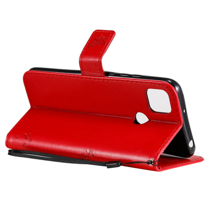 For Xiaomi Redmi 9C Tree & Cat Pattern Pressed Printing Horizontal Flip PU Leather Case with Holder & Card Slots & Wallet & Lanyard(Red) by buy2fix