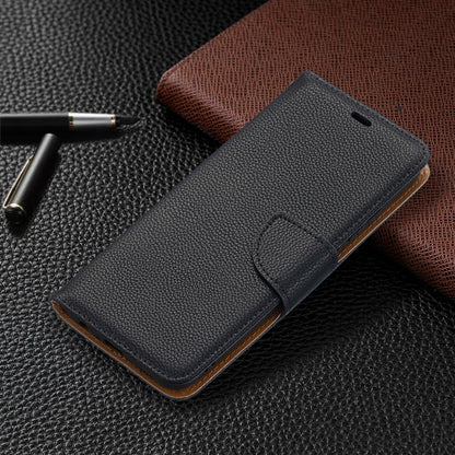 For Samsung Galaxy A02s (EU Version) Litchi Texture Pure Color Horizontal Flip Leather Case with Holder & Card Slots & Wallet & Lanyard(Black) by buy2fix