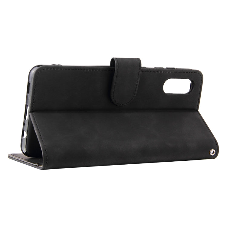 For Samsung Galaxy A02 / M02 Solid Color Skin Feel Magnetic Buckle Horizontal Flip Calf Texture PU Leather Case with Holder & Card Slots & Wallet(Black) by buy2fix
