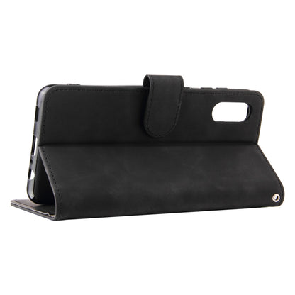For Samsung Galaxy A02 / M02 Solid Color Skin Feel Magnetic Buckle Horizontal Flip Calf Texture PU Leather Case with Holder & Card Slots & Wallet(Black) by buy2fix