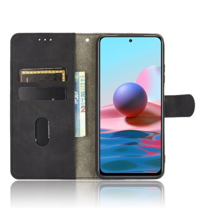 For Xiaomi Redmi Note 10 Solid Color Skin Feel Magnetic Buckle Horizontal Flip Calf Texture PU Leather Case with Holder & Card Slots & Wallet(Black) by buy2fix