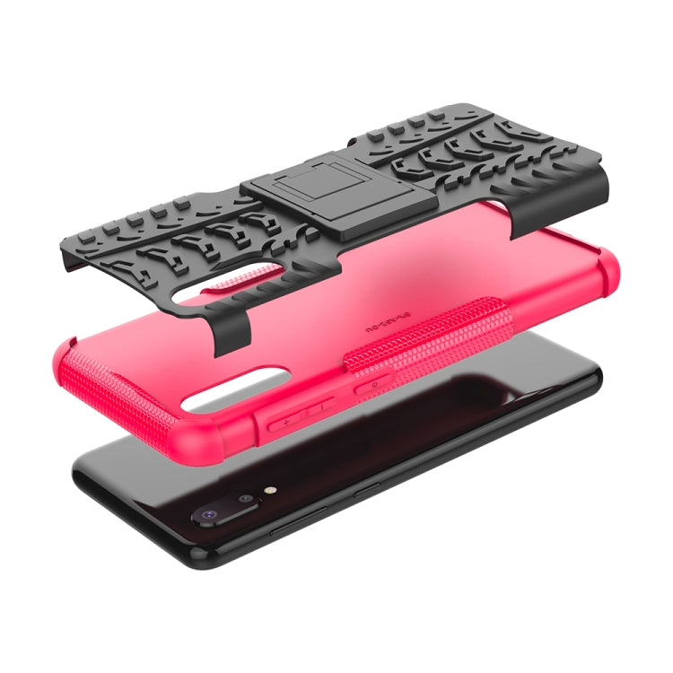 For Samsung Galaxy A02(EU Version) Tire Texture Shockproof TPU+PC Protective Case with Holder(Pink) by buy2fix