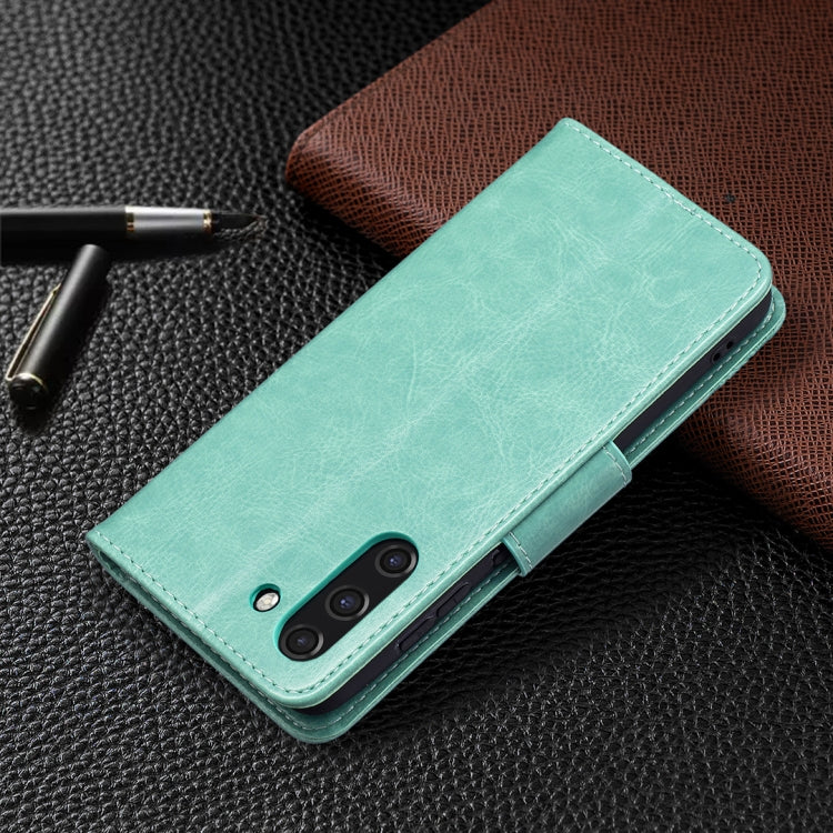 For Samsung Galaxy S21 FE Embossing Two Butterflies Pattern Horizontal Flip PU Leather Case with Holder & Card Slot & Wallet & Lanyard(Green) by buy2fix