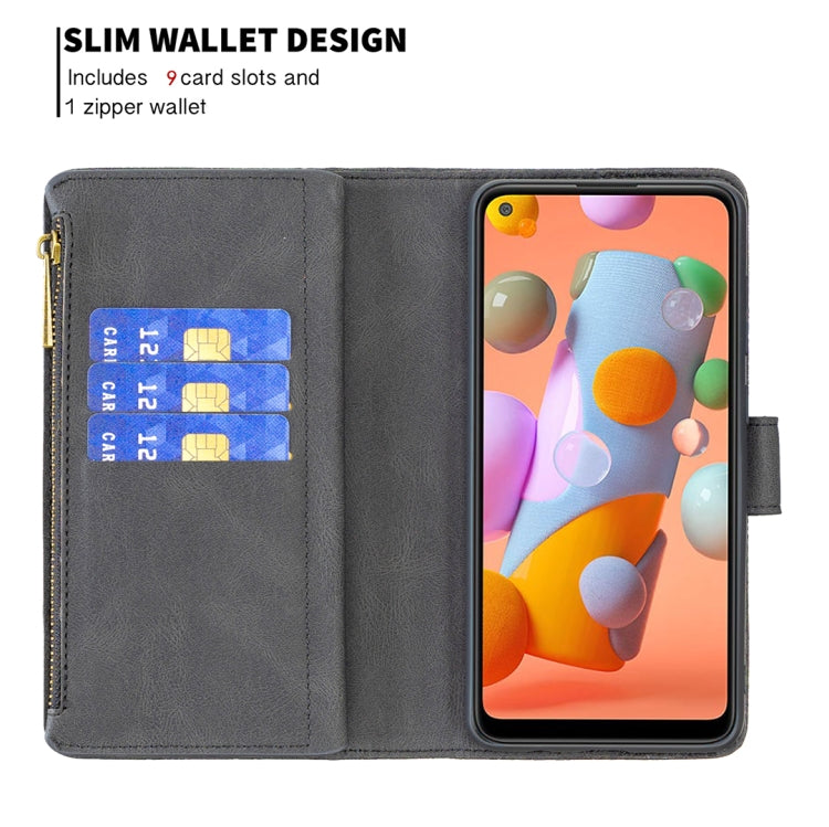 For Samsung Galaxy A11 Flying Butterfly Embossing Pattern Zipper Horizontal Flip Leather Case with Holder & Card Slots & Wallet(Black) by buy2fix