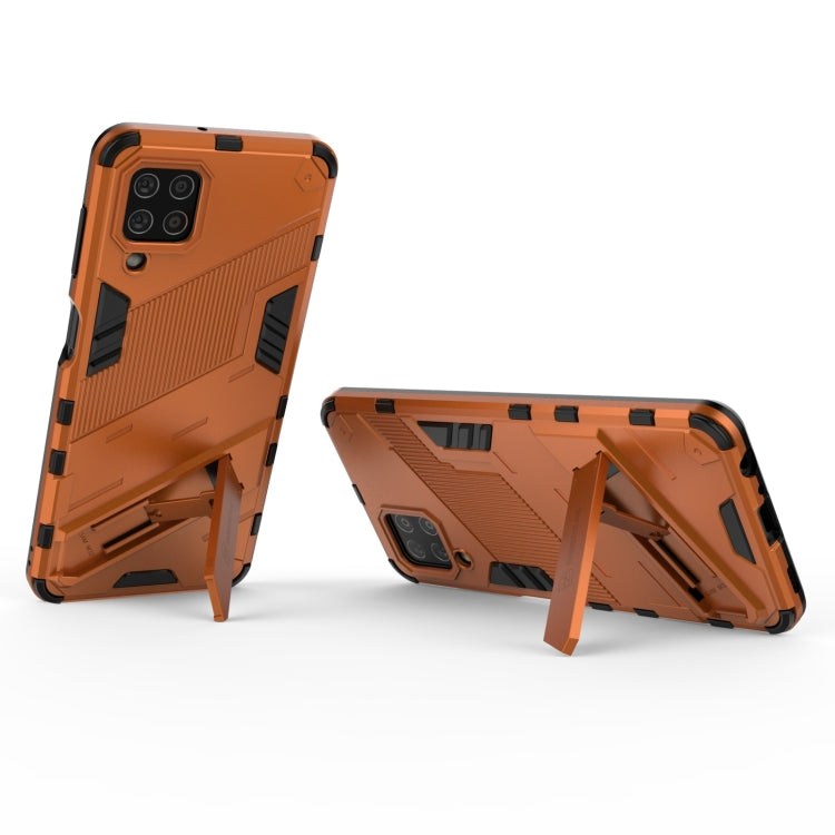 For Samsung Galaxy M32 Punk Armor 2 in 1 PC + TPU Shockproof Case with Invisible Holder(Orange) by buy2fix