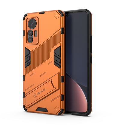 For Xiaomi 12 Lite Punk Armor PC + TPU Phone Case with Holder(Orange) by buy2fix